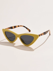 Side view of cat-eye sunglasses with yellow frame and tortoiseshell temples