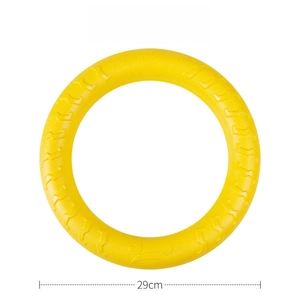 Detail view of the 29cm bright yellow anti-slip foam dog flying ring toy in macro