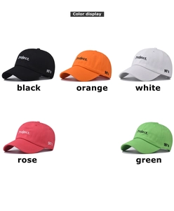 Detail of embroidered 'Project.' and '90's' text on cotton baseball caps in five colors