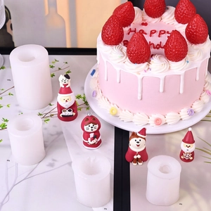 Mini Christmas silicone mold set featuring Santa and cat figurines for cake decorating