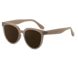 Retro oval frame sunglasses with transparent grey brown finish and dark brown lenses