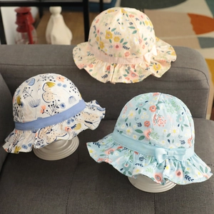 Sweet floral cotton sun hats for baby girls with bow accents and ruffled edges in three colors