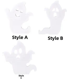 Detailed view of three cute white wooden ghost tabletop ornaments for Halloween decor