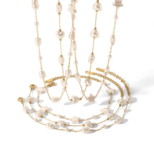 Gold stainless steel jewelry set featuring baroque pearl, heart, and star charms