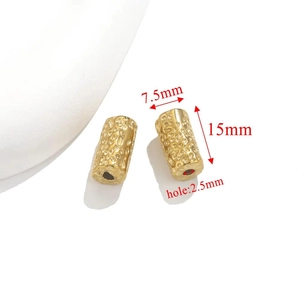 Detail showing 15mm gold textured stainless steel tube bead with 2.5mm hole size