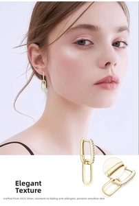 Close-up of S925 silver double oval earrings with zircon inlay and 18K gold finish