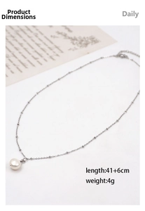 Detail of single freshwater pearl necklace with silver chain length of 41+6cm and 4g weight