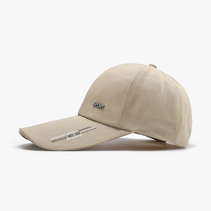 Beige sport baseball cap with long visor and metal logo for sun protection