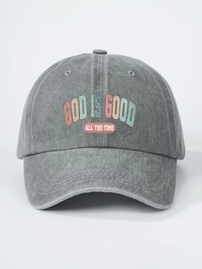 Detailed close-up of God Is Good print on grey washed denim vintage baseball cap