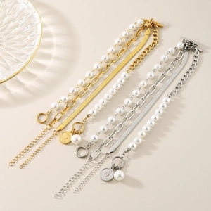 Layered stainless steel pearl bracelet set with coin pendant and flat snake chain