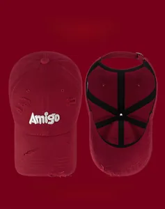 Detail of red distressed baseball cap with Amigo 3D embroidery and inner strap structure