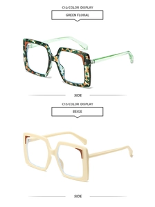 Detail view of square sunglasses in green floral and beige frames on white background