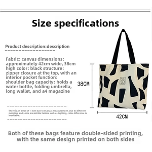 Detail view of large canvas tote bag showing 42x38cm dimensions and zipper closure