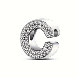 Detailed view of silver letter C charm with micro-pave sparkling cubic zirconia stones