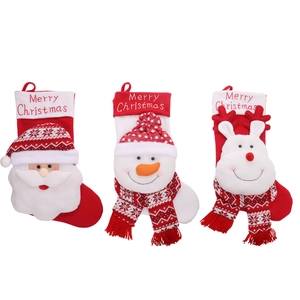Three Christmas stockings with 3D Santa, Snowman, and Reindeer designs on white background