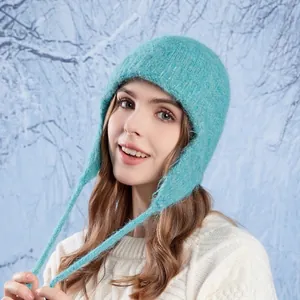 Turquoise wool knit trapper hat with ear flaps and braided ties for winter warmth