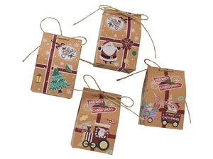 Detail of four Christmas kraft paper candy boxes with holiday prints and twine ties