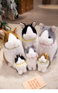 Detailed plush rabbits in multiple sizes and colors with lace collars and keychains