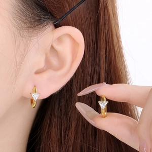 Detailed view of 18K gold plated hoop earrings featuring triangular clear zircon stone