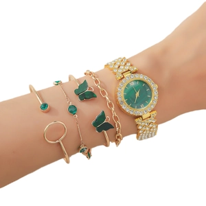 5pcs set featuring emerald green watch and gold butterfly bracelets on a model's wrist