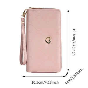 Pink quilted double zipper wallet with heart charm and detailed size measurements