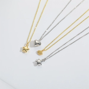 Polished minimalist star and heart pendant necklaces in gold and silver finishes