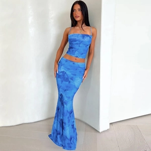 Detail of blue tie-dye two-piece set featuring cropped camisole and slim-fit maxi skirt