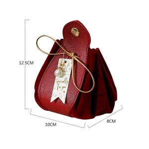 Detailed size view of dark red velvet and leather wedding gift bag with dimensions