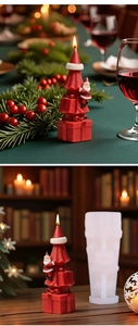 Detail of Christmas tree candle with Santa silicone mold for festive DIY candle making
