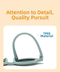 Detail showing high flexibility of mint green TPEE frame sunglasses for infants