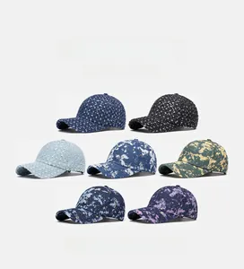 Collection of seven distressed denim baseball caps featuring sequins and varied embroidery