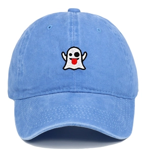 Close-up of cute ghost embroidery on light blue washed cotton baseball cap