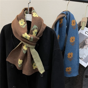 Chic knitted floral scarves in brown and blue colors for warm winter fashion styling