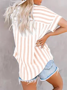 Back view of a casual beige striped short-sleeve shirt with relaxed fit on a model