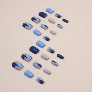 Short T-shaped matte dark blue press-on nails with abstract graffiti and color block design