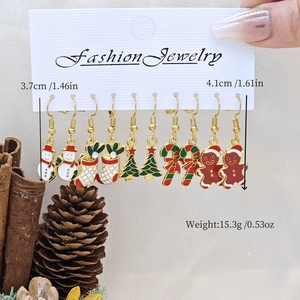 Detailed size and weight guide for Christmas enamel earring set with festive motifs