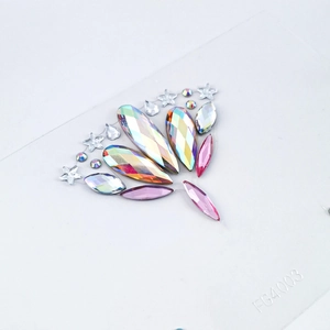 Face jewel tattoos with pink and AB rhinestones in droplet and star shapes