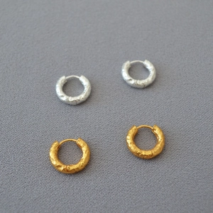 Textured hammered metal hoop earrings in gold and silver finish for women