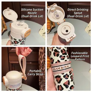 Insulated leopard print stainless steel bottle with dual-drink lid and carry strap