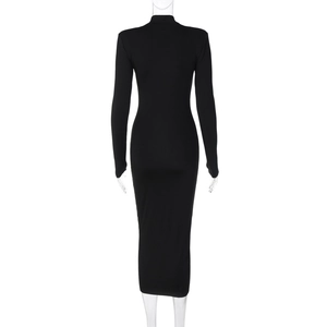 Rear view of sleek black long sleeve bodycon dress on mannequin with high neck detail