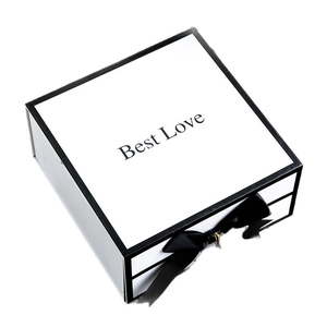Elegant white gift box with black ribbon and Best Love text for lipstick or clothing