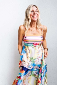 Detailed shot of tropical Oceania print and silky satin fabric on the summer slip dress
