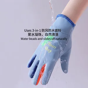 Waterproof blue children's winter ski gloves with dinosaur print and warm fleece lining