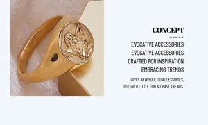 Detail shot of vintage 18k gold plated angel signet ring with cupid relief design