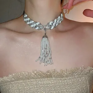 Chic silver-tone chain necklace with zircon details and long pearl tassel pendant