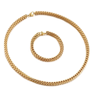 Hip-hop style golden braided chain set featuring a matching necklace and bracelet for men