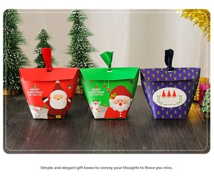 Three festive Christmas gift boxes with ribbons featuring Santa and reindeer illustrations