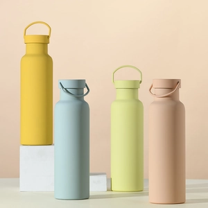 Minimalist portable thermal flasks in pastel colors with ergonomic round handles