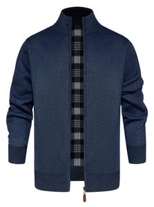 Detailed view of navy blue knitted cardigan with zipper closure and checkered lining detail