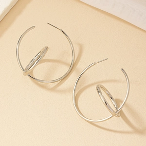 Minimalist silver geometric C-shaped hoop earrings with unique spiral layered design
